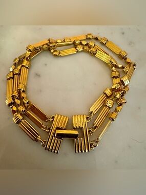 Gold Tone Triple Strand Station Bracelet with Geometric Details